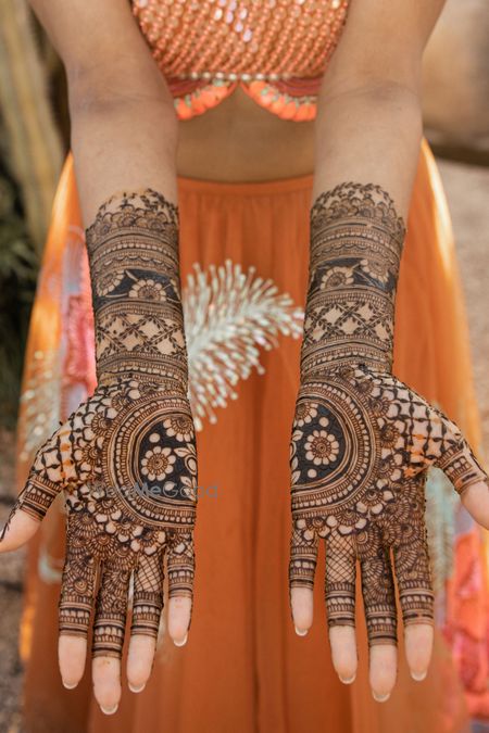 Photo of half and half modern mandala mehendi design for bride