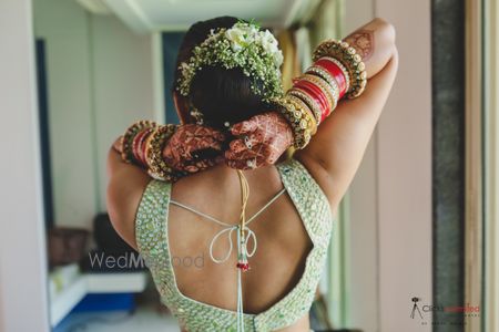 Photo of A pretty shot of the bride with her bridal bun