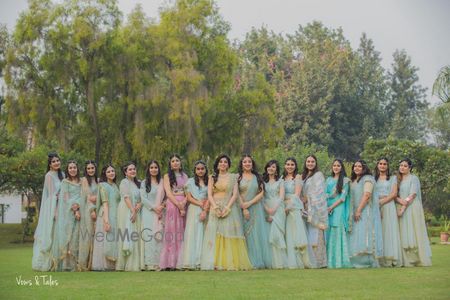 Photo of Matching pastel bride and bridesmaids