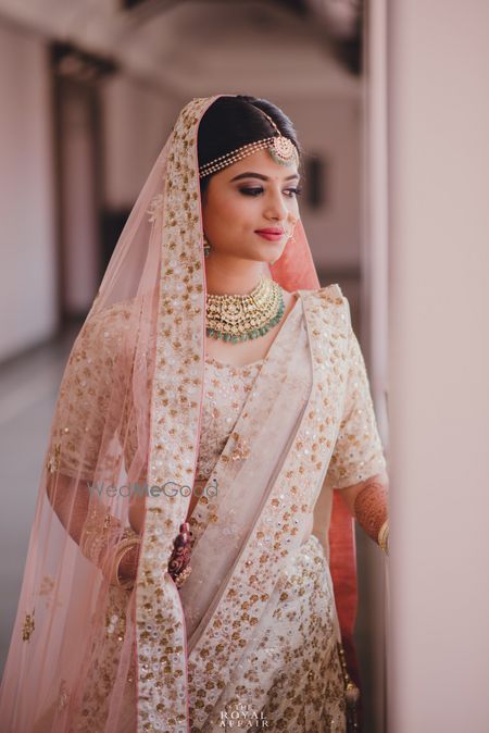 White Wedding Photoshoot & Poses Photo white and gold bridal lehenga