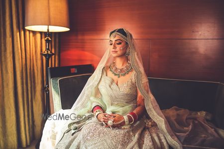 Photo of Shot of a bride dressed in mint green lehenga