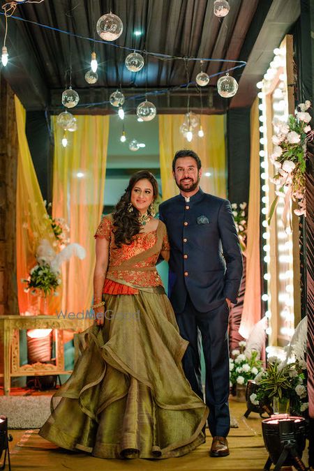 Photo of Couple portrait with hanging glass orbs