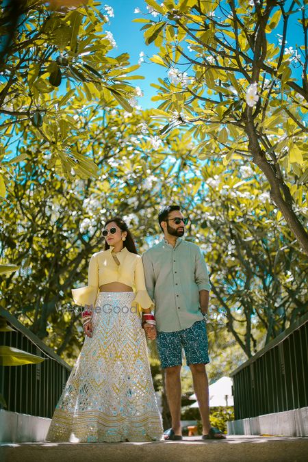 Photo of Indo western yellow lehenga with unique blouse