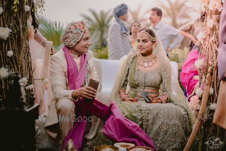 Photo of Candid couple shot with offbeat bride