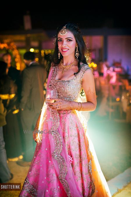 Photo of Light pink lehenga with scalloped dupatta edge