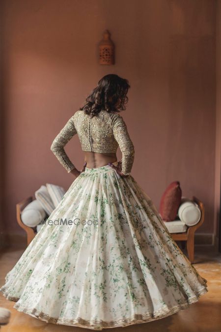 Photo of Sabyasachi floral print lehenga for engagement