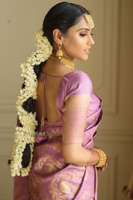 Photo of south indian floral bridal braid with mogra