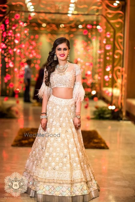 Photo of Manish malhotra white lehenga with frill