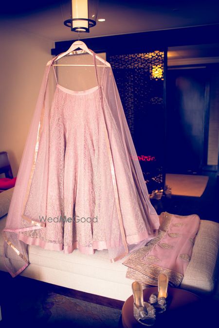 Photo of lehenga on hangerm pastel pink