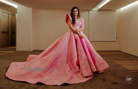 Photo of floor length light pink gown with train