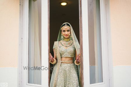 Photo of Shimmery mint green bridal lehengA