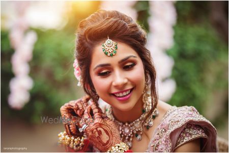 Photo of A cute bridal getting ready portrait