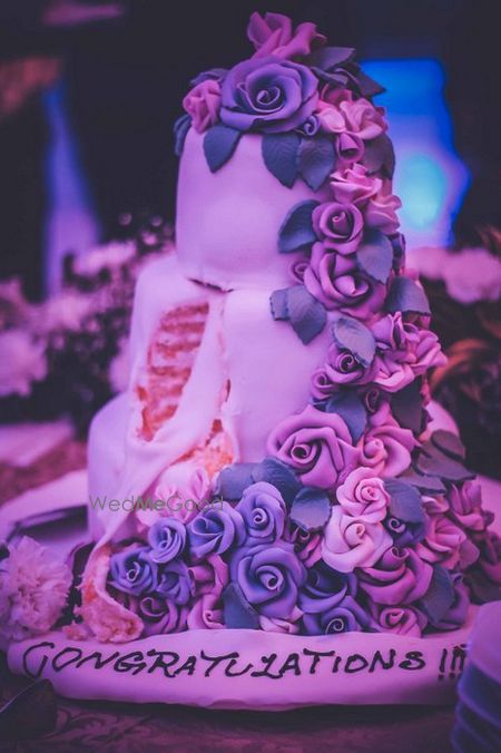 Photo of lilac and purple cake with roses