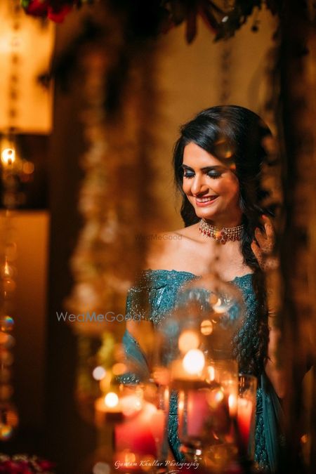 Photo of Engagement day bridal portrait in teal outfit