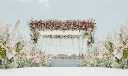 Photo of outdoor mandap with floral decorations