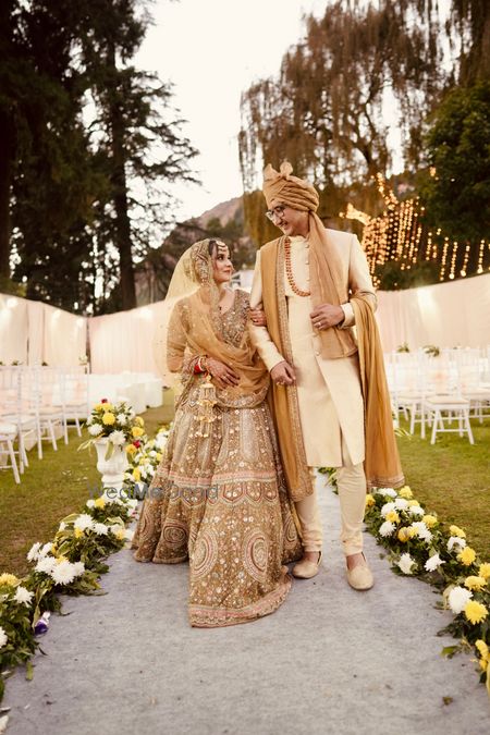 Photo of Couple walking down the aisle photo