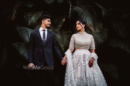 Photo of Couple posing on their engagement ceremony.