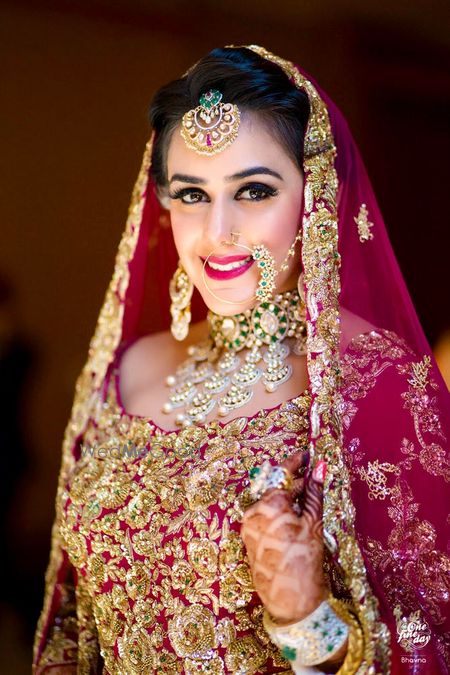 Photo of Bride in pomegranate pink