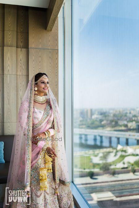 Photo of Bridal portrait by the window