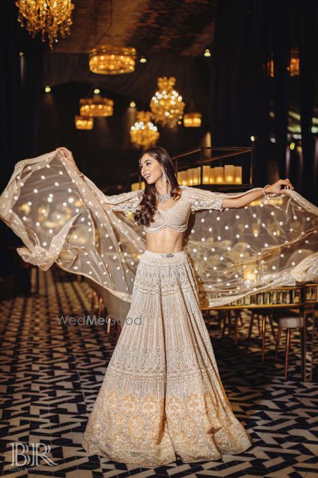 Photo of Reception lehenga in nude and ivory by Falguni Shane Peacock