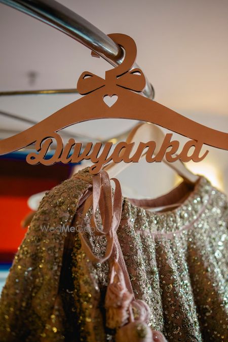 Photo of Personalised bridal hanger for lehenga.