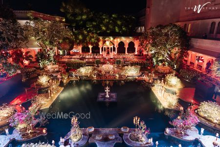 Photo of Gorgeous destination wedding venue by the pool side with floral decor