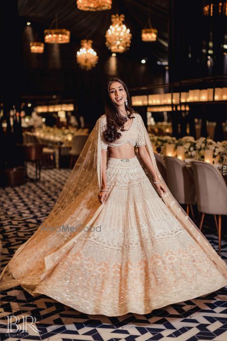 Photo of Reception lehenga in nude and ivory by Falguni Shane Peacock