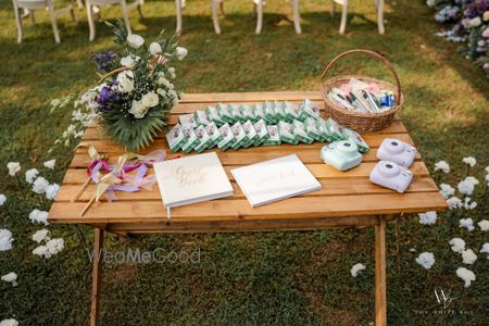 Photo of Fun guestbook table with disposable cameras for the guests to use