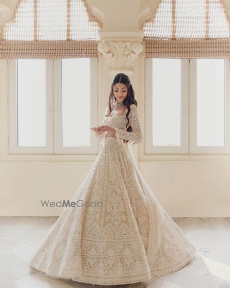 Photo of Alanna in white Manish Malhotra lehenga