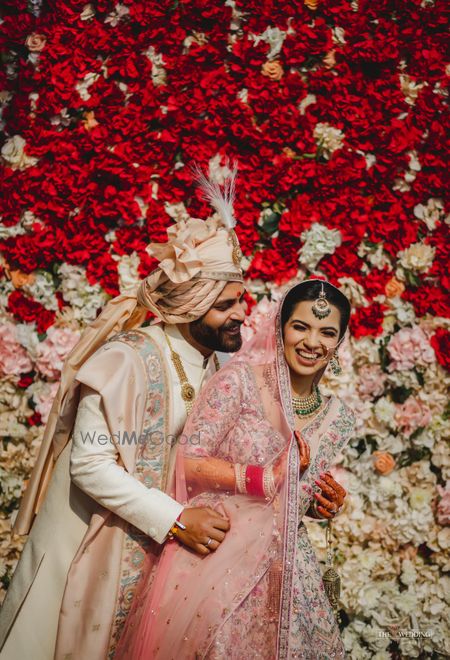 Photo of Candid shot of a colour-coordinated couple.