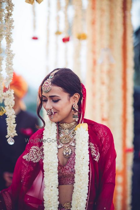 Photo of Happy bride with unique bridal look