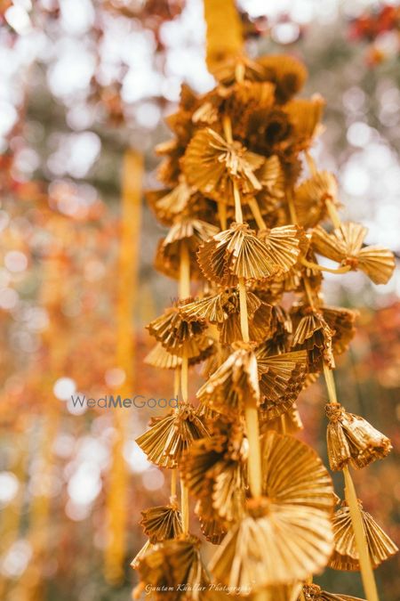 Photo of Gold decor idea for mehendi with gota hangings