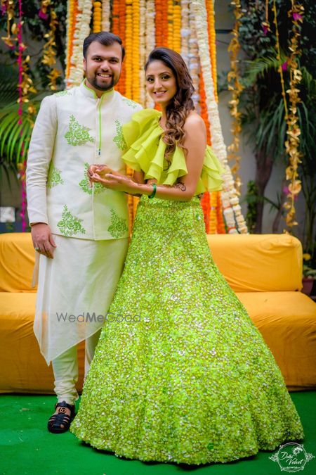 Photo of Unique mehendi lehenga with ruffled blouse