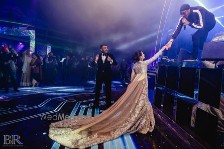 Photo of beige cocktail gown with a massive train