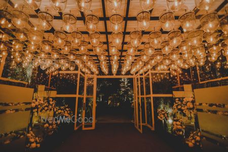 Photo of Suspended lights decor at the wedding venue entrance