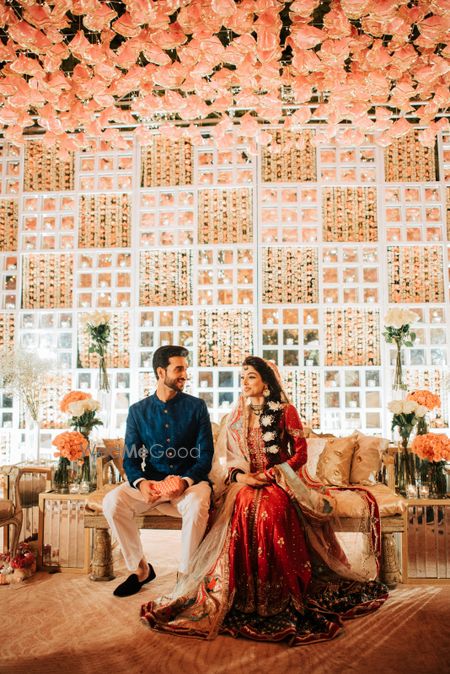 Photo of Couple portrait of a Muslim bride and groom from their mehndi ceremony.