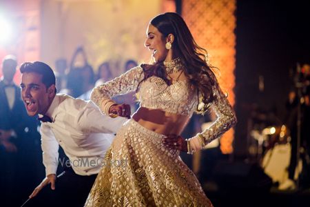 Photo of  Bride and groom dancing at their reception ceremony.