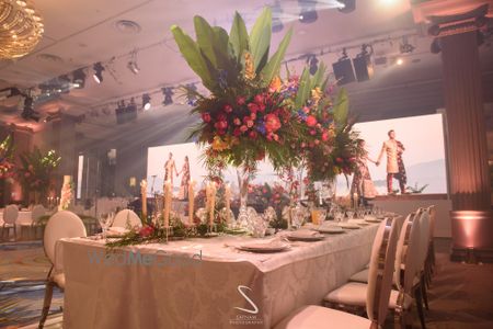 Photo of grand table centrepiece idea for reception