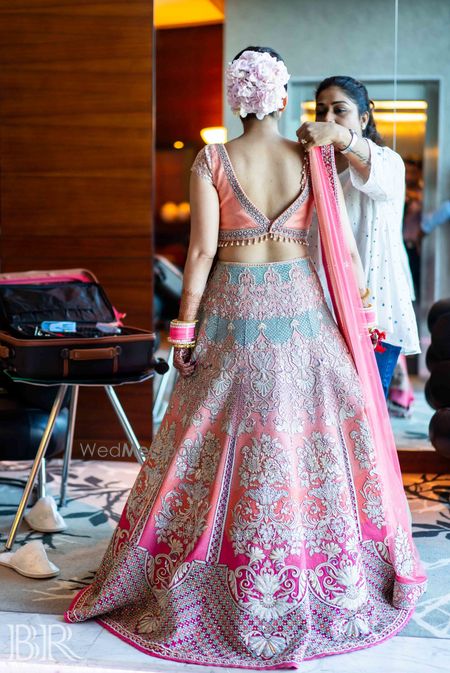 Photo of Bridal getting ready shot with unique blouse back