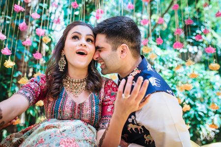 Photo of Cute couple shot on mehendi.