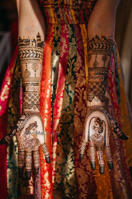 Photo of unique and minimal mehendi on bride's hands