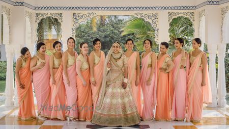 Photo of Bride with bridesmaids on wedding day