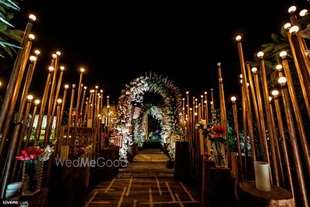 Photo of Entry walkway with bulbs on either side.