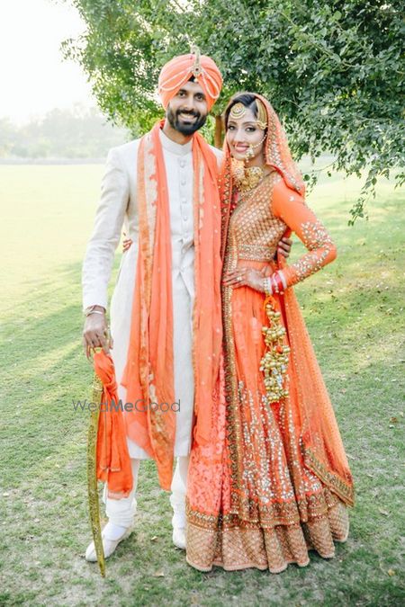 Photo of peach floor length layered anarkali lehenga by Sabyasachi