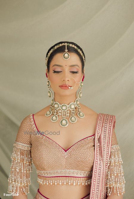 Photo of Gorgeous bridal jewellery in jadau and polki style for the wedding day