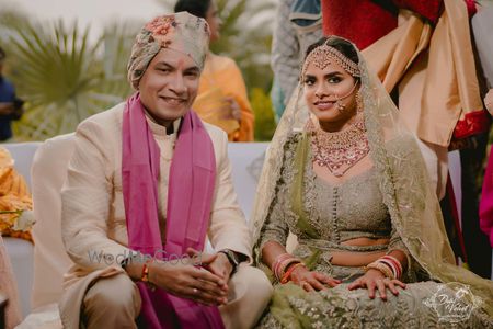 Photo of Offbeat couple portrait during outdoor wedding