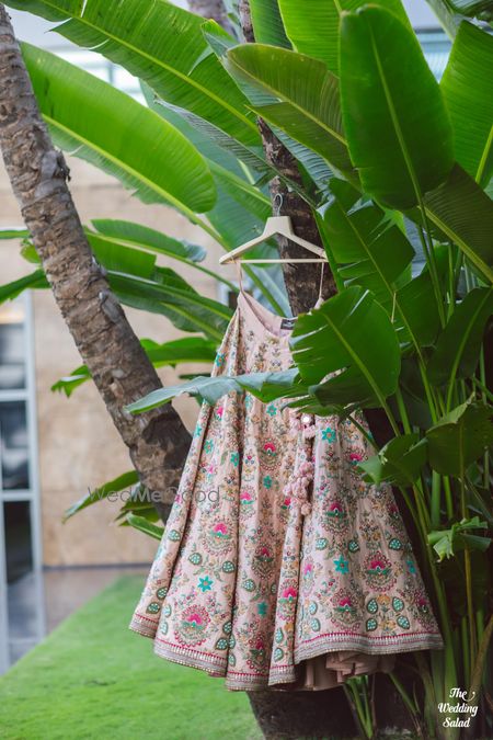 Photo of pastel pink sabyasachi lehenga on hanger