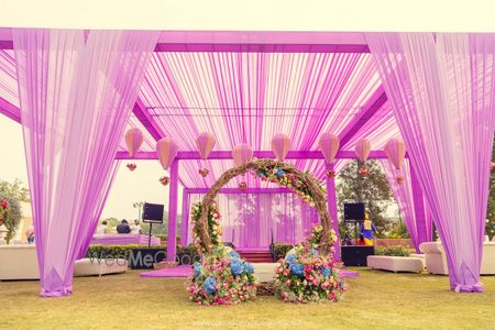 Photo of Bridal mehendi seat with hot air balloon hangings