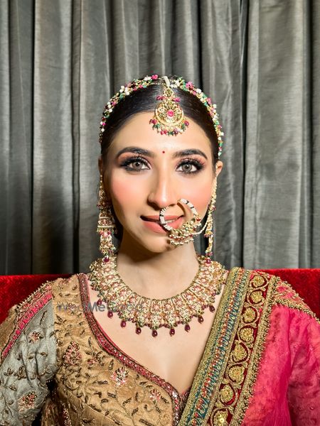 Photo of bold eyes with a minimal face for a royal bridal look