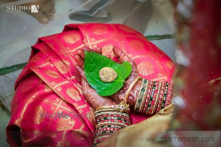 Photo of Coral Pink Kanjivaram Saree with Gold Print